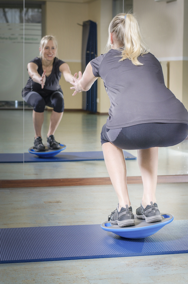 Kniebeugen mit Balance Board